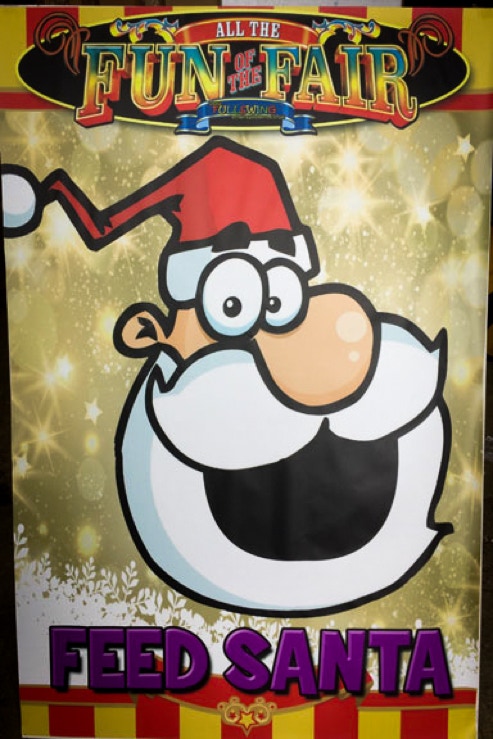 Christmas carnival game hire Feed santa